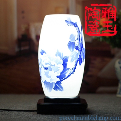 blue and white pastels thin tires drum shape porcelain table lamp 